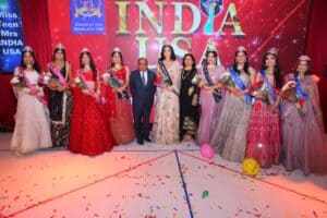 Dharmatma and Neelam Saran of Worldwide Pageants with Participants and Judges